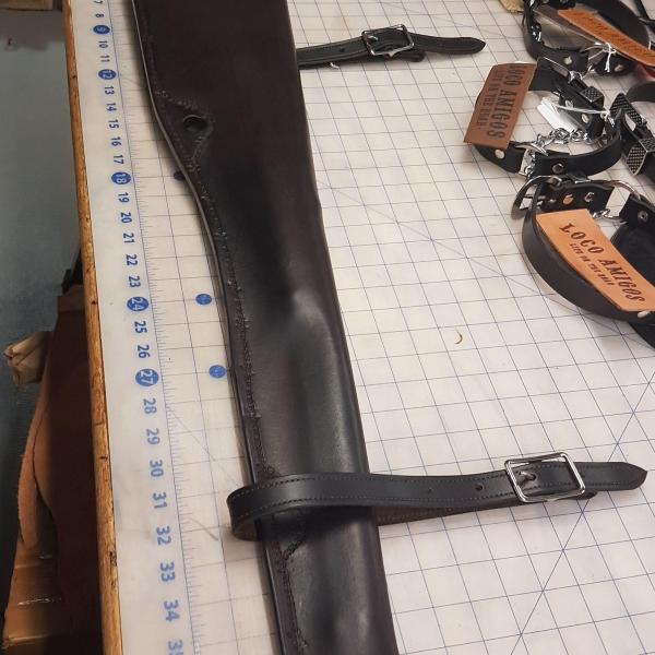 Rifle Scabbards Assorted And Some With Mounting Straps To Attach to What Ever You Ride. Horse Or Horse Powered Vehicle With Wheels. Custom, Full Grain Leather, Hand tooled, Hand made in the Okanagan, Oliver, B.C., Canada.